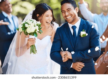 Love, laughing and couple walking at their wedding with guests in celebration of romance. Happy, smile and young bride with bouquet and groom with crowd celebrating at the outdoor marriage ceremony.