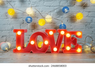 Love LED sign decorative letters for Valentine's day on white brick wall background - Powered by Shutterstock