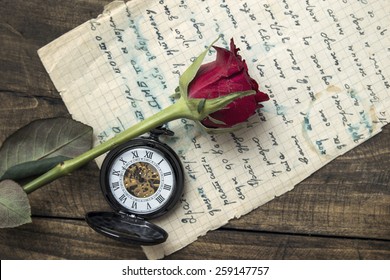 Love Letter And Rose On Wooden Background, From Above 