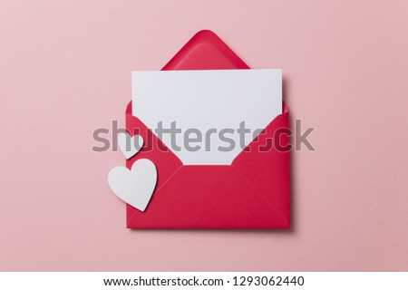 Photo of Love letter. white card with red paper envelope mock up