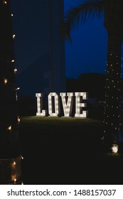 Love Letters Illuminated At Night At Wedding