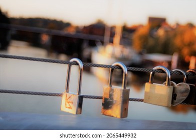 Love locks attached to the bridge railing