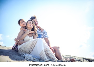 Love makes a family. Family on sand. - Powered by Shutterstock