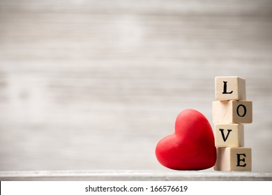 Love message written in wooden blocks.