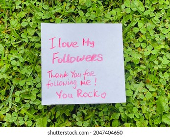 I Love My Followers! Thank You For Following Me! You Rock! Handwritten Text On Whiteboard.