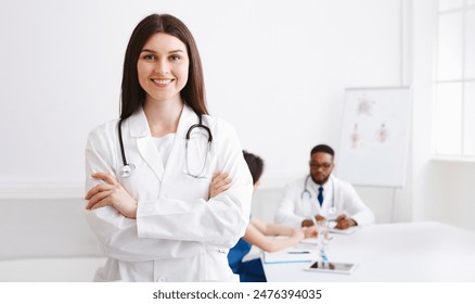 Love My Job. Happy Practitioner At Medical Conference Smiling To Camera In Meeting Room, Empty Space - Powered by Shutterstock