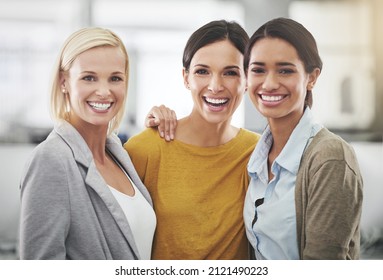 I Love My Team. Cropped Portrait Of Three Businesswomen Standing In The Office.