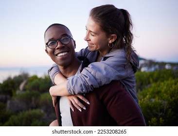 Love, nature and interracial couple piggyback on mountain adventure for holiday, vacation and hiking on weekend. Travel, dating and happy man carry woman enjoying calm, outdoor freedom and peace - Shutterstock ID 2253208265