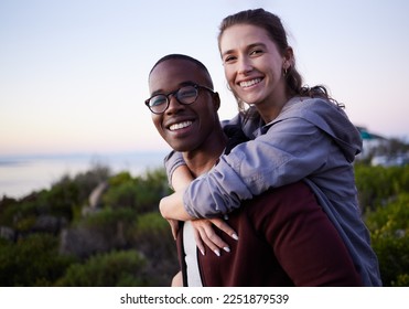 Love, nature and portrait of interracial couple on mountain for holiday, vacation and adventure on weekend together. Travel, dating and happy man piggyback woman enjoy calm, outdoor freedom and peace - Shutterstock ID 2251879539