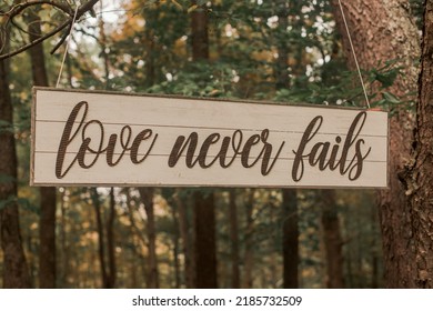 Love Never Fails Wedding Sign