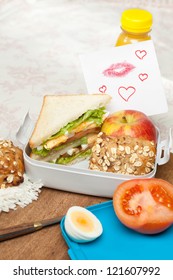 Love Note With Lipstick Kisses In A Lunchbox