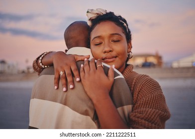 Love, peace and calm black couple hug while relax on outdoor date for freedom, bonding and enjoy quality time together. Romance, vacation and young gen z man and woman on romantic holiday in Jamaica