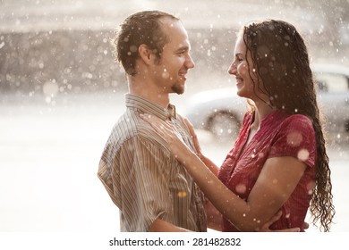 couple hugging in the rain