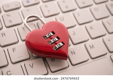 Love red heart shape code lock on white keyboard background. Find love, romantic, dating in online internet website, app dating community platform concept. Quick and easy.
