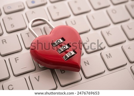 Love red heart shape code lock on white keyboard background. Find love, romantic, dating in online internet website, app dating community platform concept. Quick and easy.