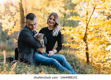 love, relationship, family and people concept - smiling couple having fun in autumn park - Shutterstock ID 1464488141
