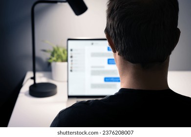 Love scam and romance fraud with messages. Online chat catfish with fake identity. Infidelity, cheating husband with secret relationship. Fraudster, swindler, scammer or cheater with laptop computer. - Shutterstock ID 2376208007