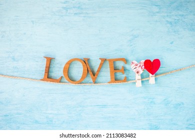 Love Sign With Two Clip Heart On Rope With Space On Blue Texture Background, Valentine Card Background Idea, Happy Aniversary, Love And Romance Greeting Card Background