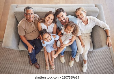 Love, Smile And Diversity Portrait Of Happy Family Relax On Living Room Sofa And Bonding During Annual Family Reunion Above View. Grandparents, Parents And Children Enjoy Fun Quality Time Together