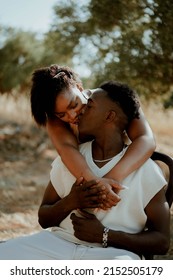 Love Story. Pair Photo Session With A Beautiful Couple Man And Woman. Passion, Love, Kiss. Nature, Summer, Park, Greece, Crete, Olive Grove