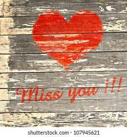 love symbol and  word  miss you on old wooden wall background