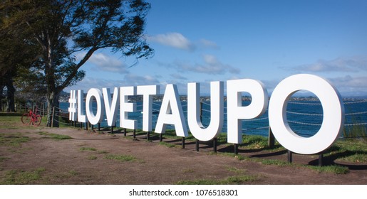 Love Taupo sign on the shore of Lake Taupo.  