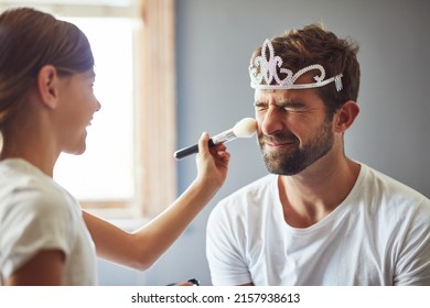 I love that Daddy plays dress up with me. Cropped shot of a little girl putting makeup on her father. - Shutterstock ID 2157938613