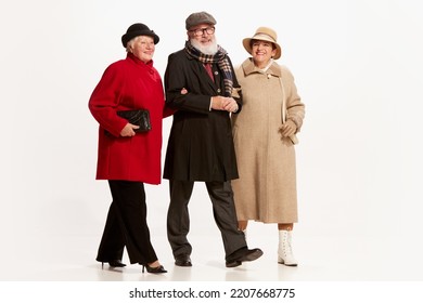 Love Triangle, Intrigue. Handsome Senior Man And Two Charming Women In Vintage Retro Style Clothes Isolated On White Background. Concept Of Relations, Family, 1960s American Fashion Style And Art.