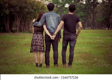 Love Triangle. Young Woman In Relationship With Two Men.