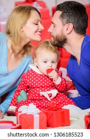 Love And Trust In Family. Bearded Man And Woman With Little Girl. Valentines Day. Day To Celebrate Their Love. Shopping. Boxing Day. Father, Mother And Doughter Child. Happy Family With Present Box.