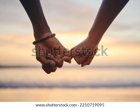 Love, trust and holding hands with couple at beach on Cancun vacation at sunset for happy, goals and support. Summer, vision and travel with black man and woman by the ocean together for holiday