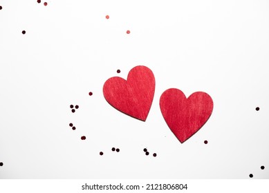 Love, Valentine day symbol, design element. Two heart red color wood isolated on white. Wooden texture heart shape decoration