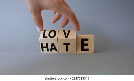 Love vs Hate symbol. Businessman Hand turns cubes and changes word Hate to Love. Beautiful grey background. Valentines day and Love vs Hate concept. Copy space - Shutterstock ID 2247313345