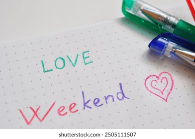 love weekend write between colorful pens  - Powered by Shutterstock