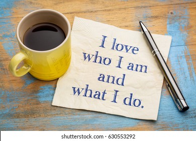 I Love Who I Am And What I Do - Positive Affirmation Words On A Napkin With A Cup Of Coffee