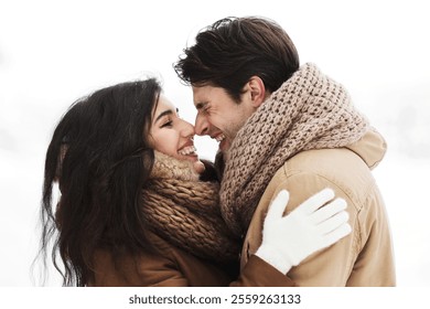 Love In Winter. Sweet Couple Rubbing Their Noses Hugging Standing In Beautiful Snowy Forest. - Powered by Shutterstock