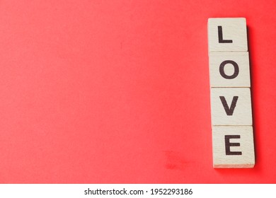 Love wooden block word with red background. heart and love concept - Powered by Shutterstock