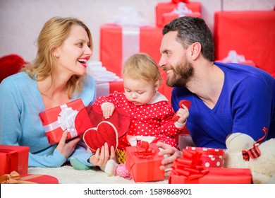 Love You. Father, Mother And Doughter Child. Shopping Online. Boxing Day. Love And Trust In Family. Bearded Man And Woman With Little Girl. Happy Family With Present Box. Valentines Day. Red Boxes.