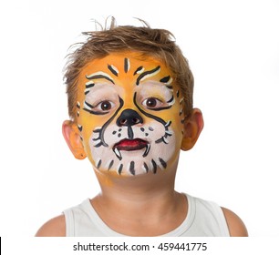 lovely adorable kid with paintings on his face as a tiger or lion