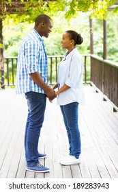 Lovely African American Couple Holding Hands Outdoors