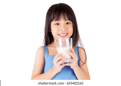 Lovely Asian Girl Drinking A Glass Of Milk