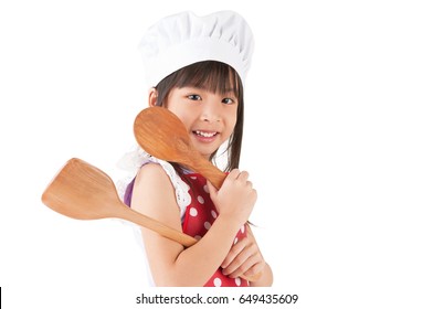 Lovely Asian Girl Holding Cooking Utensils On White Background