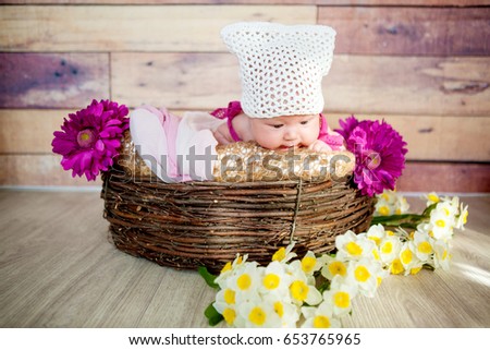 Lovely baby in basket