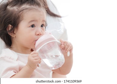 Lovely baby to drink water