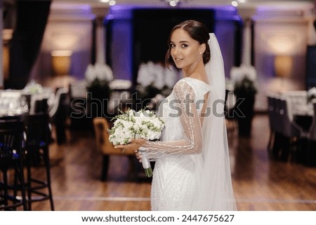 Similar – Image, Stock Photo sophisticated intricate flowers bouquet in vase. Floral arrangement on black background.