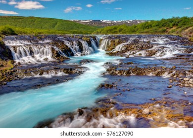 The lovely Bruarfoss waterfall in Iceland on a sunny day