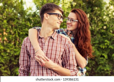 Lovely Couple In Glasses. Positive Outdoors Photo