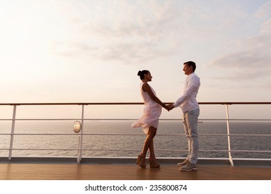 Lovely Couple Holding Hands On A Cruise Ship