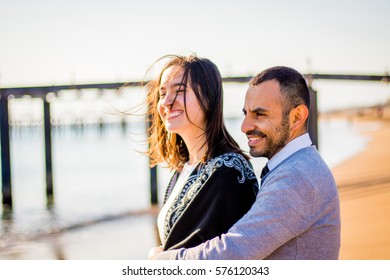 Lovely couple on the beach - Shutterstock ID 576120343