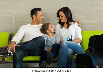 Lovely Family Waiting At Airport Lounge